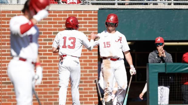 Alabama's Bryce Eblin (13) and Coleman Mizell (15) on March 10, 2024.